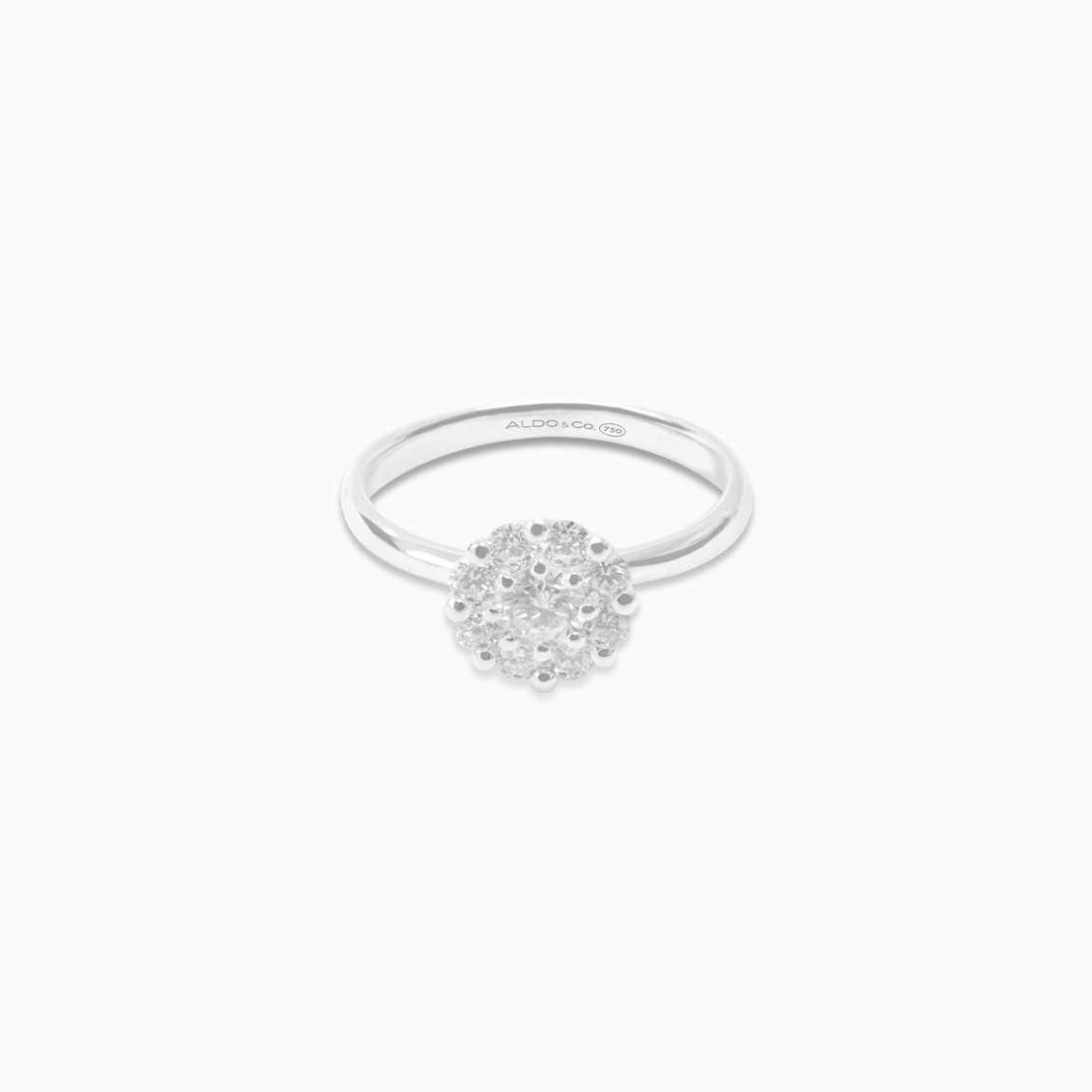 Anillo oro blanco 18K roseta con brillante
