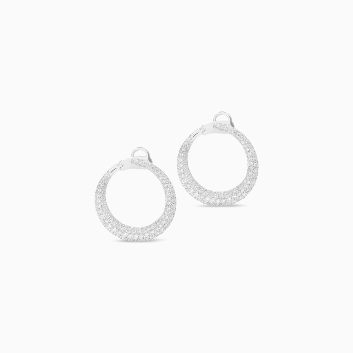 Aretes oro blanco 18K redondos calado