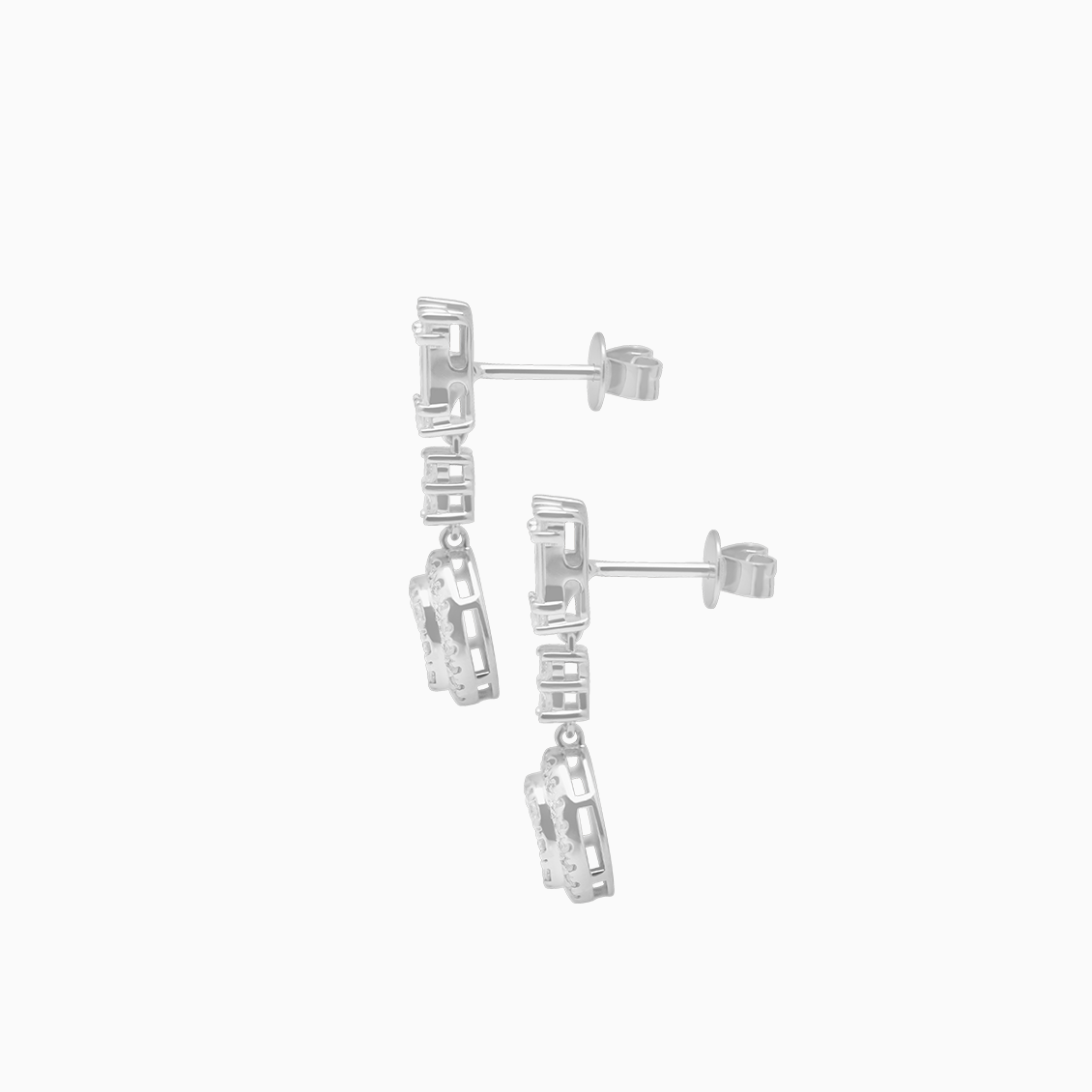 Aretes oro blanco 18K largos con brillantes baguette y redondos