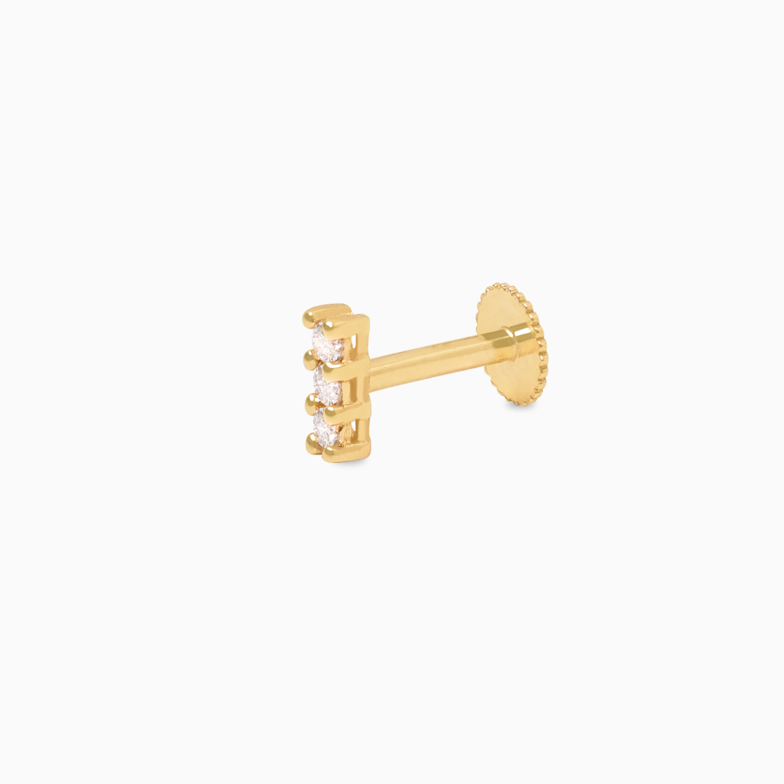 Piercing en oro amarillo de 18K barrita con brillantes