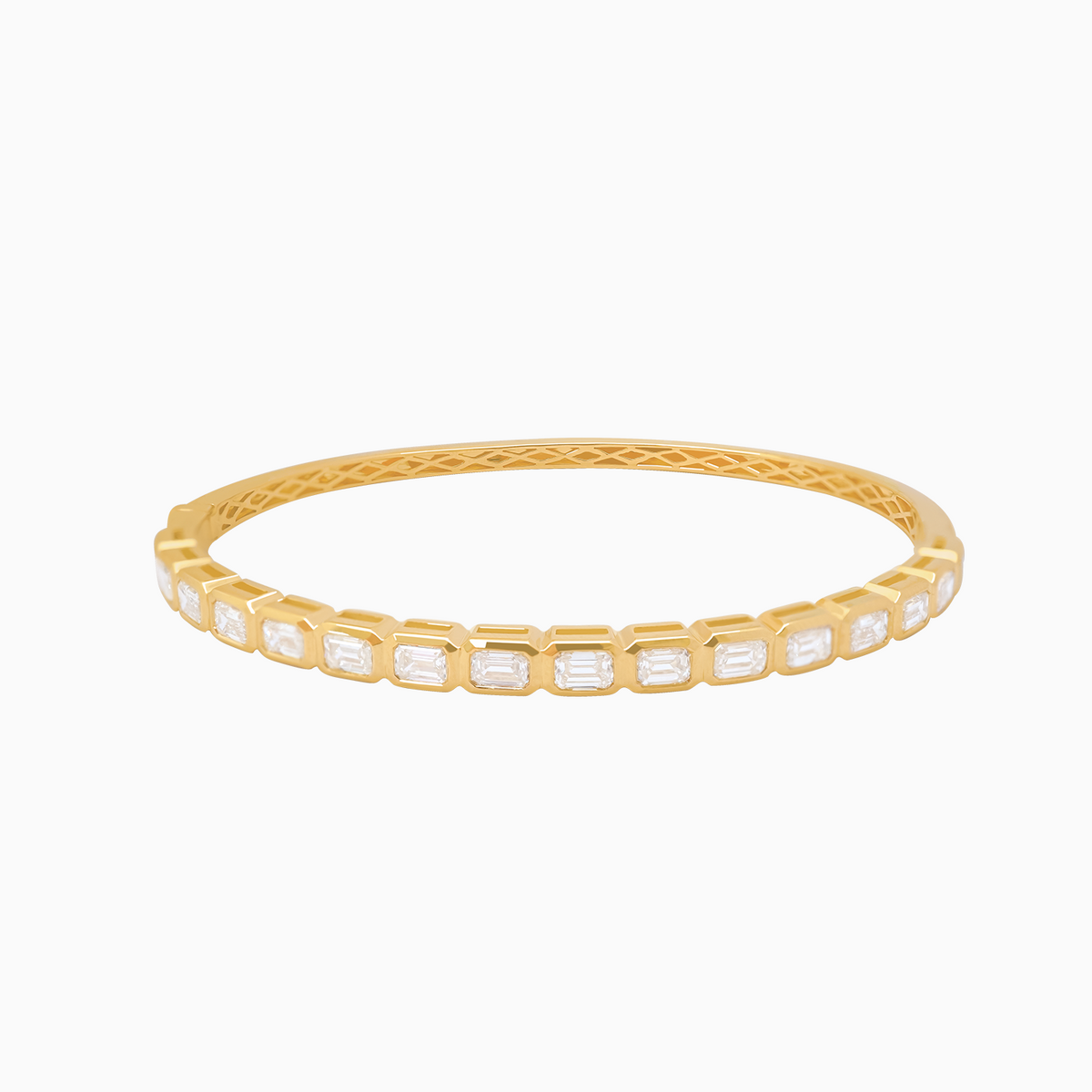 Pulsera en oro amarillo 18K bangle oval con diamantes esmeraldas