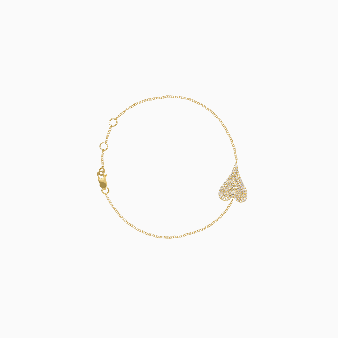 Pulsera oro amarillo 18K con placa corazon con brillantes