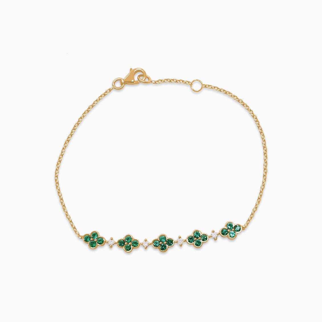 Pulsera oro rosa de 18K con centro tennis con flores esmeraldas