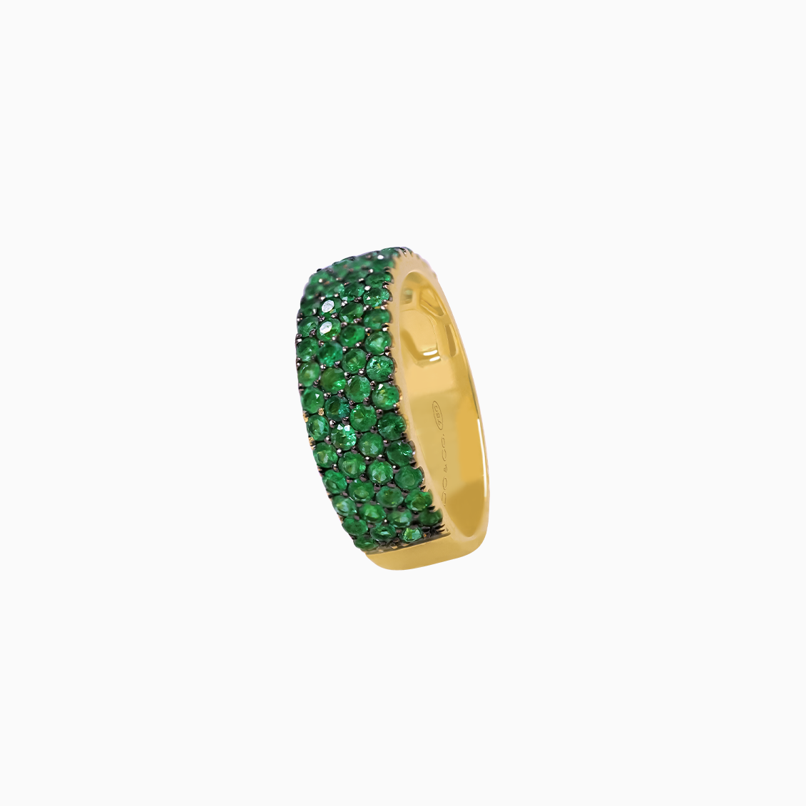 Anillo oro amarillo 18K medio rivière con cuatro hileras de esmeraldas