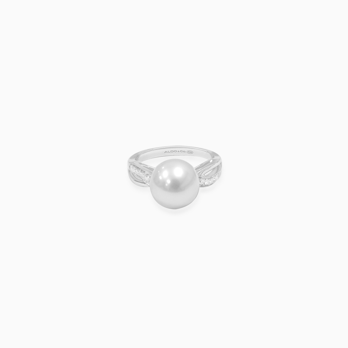 Anillo oro blanco 18K perla con brillantes laterales