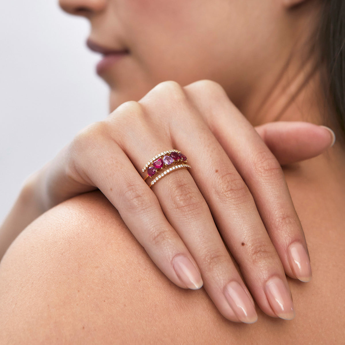 Anillo espiral oro amarillo 18K rubíes y brillantes