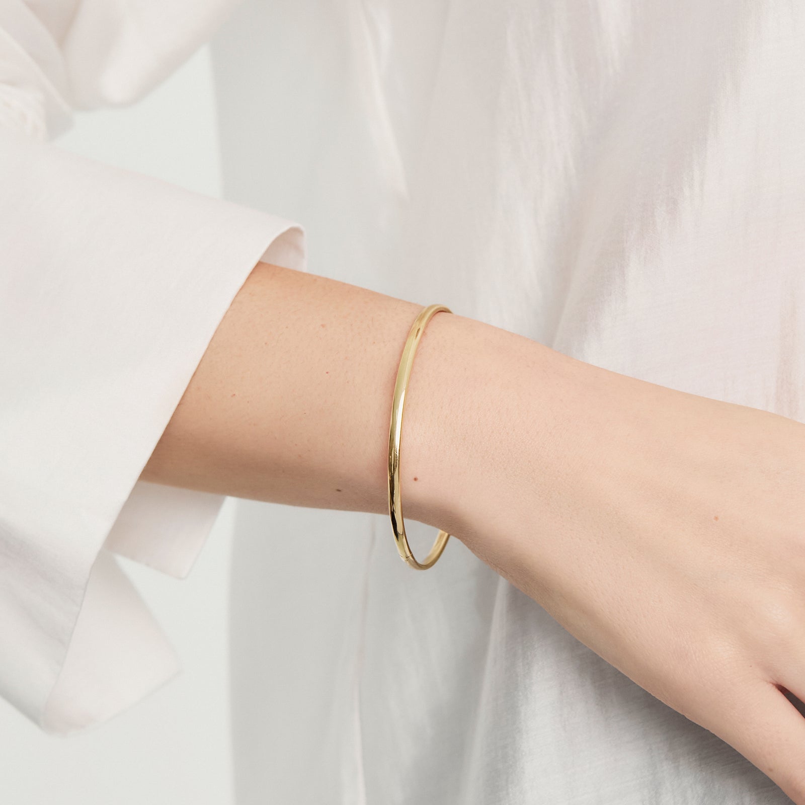 Bangle en oro amarillo de 18K cinta