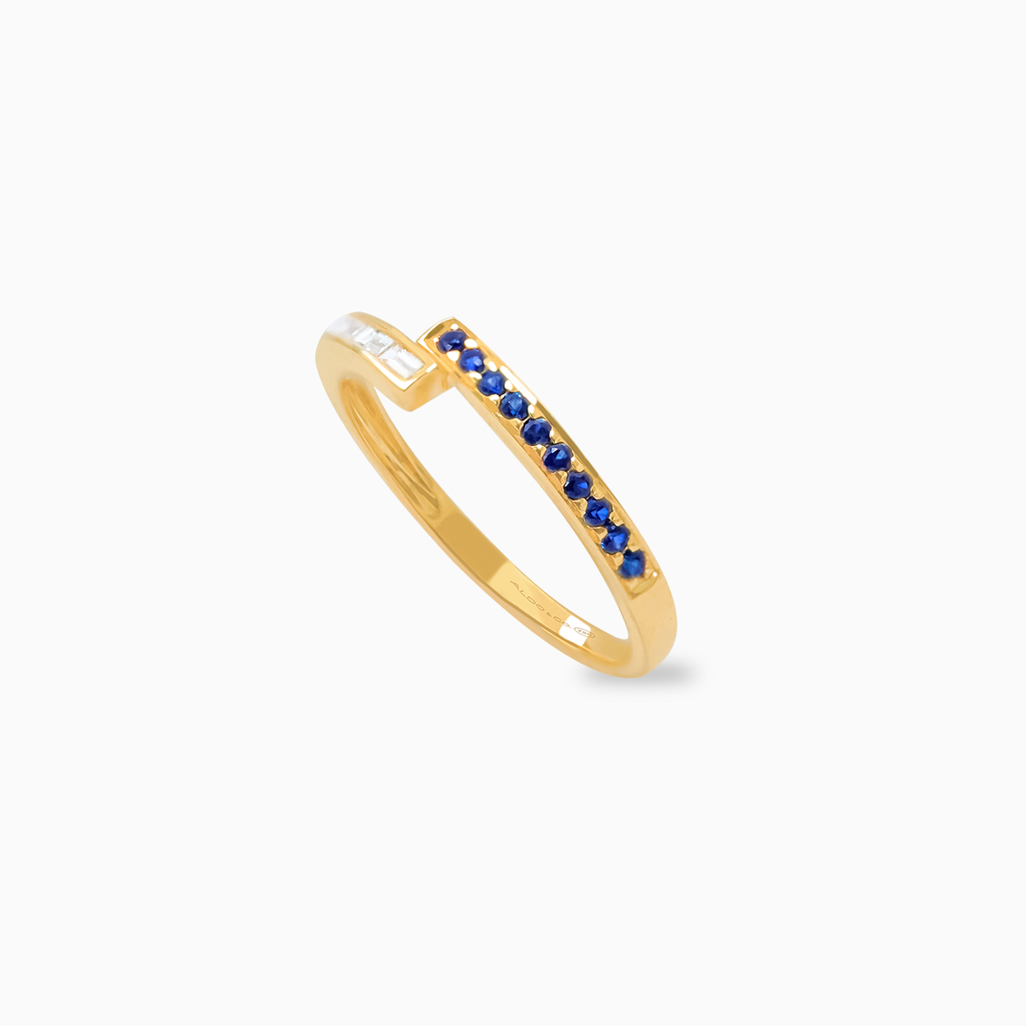 Anillo oro amarillo 18K cruzado con zafiros y brillantes