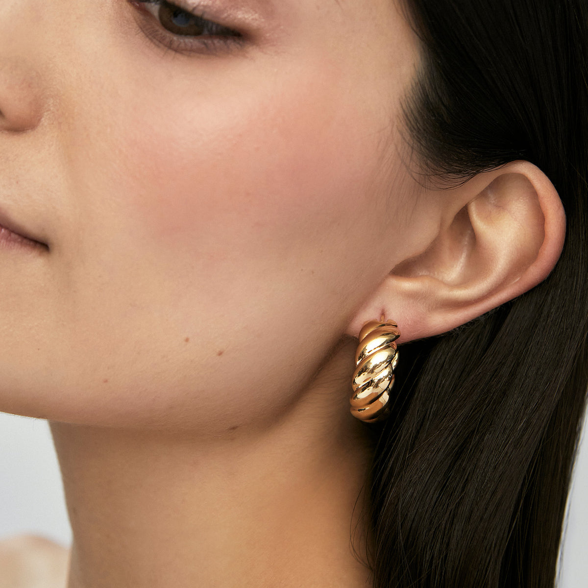 Aretes oro amarillo 18K argollas trenzadas