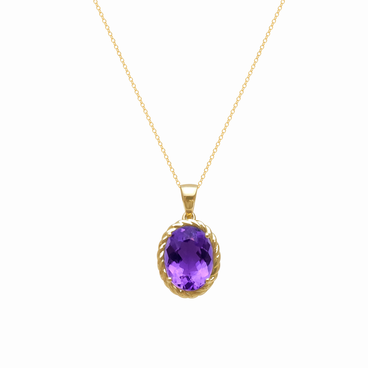 Dije en oro amarillo de 18K con amatista y bisel entorchado