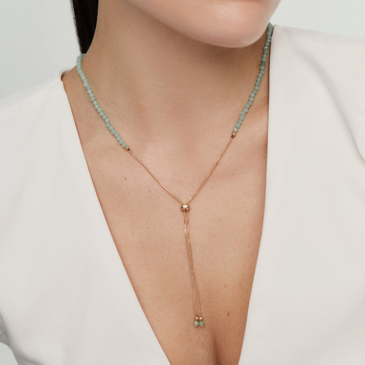 Collar en oro amarillo 18K con cuentas aventurinas en V y con cadena Franco