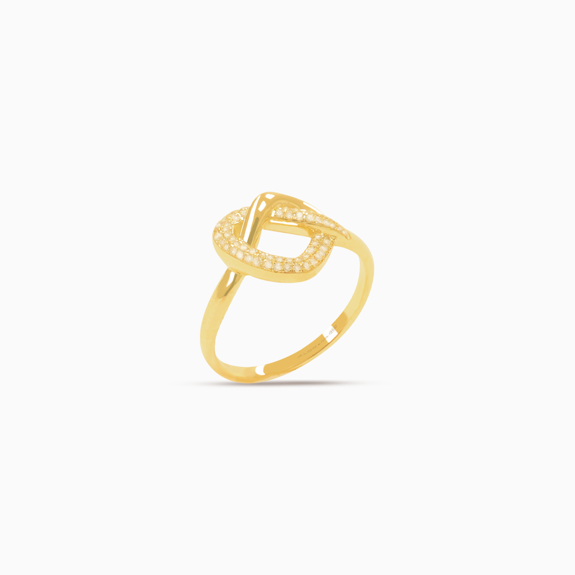 Anillo oro amarillo 18K nudo corazón calado con brillantes