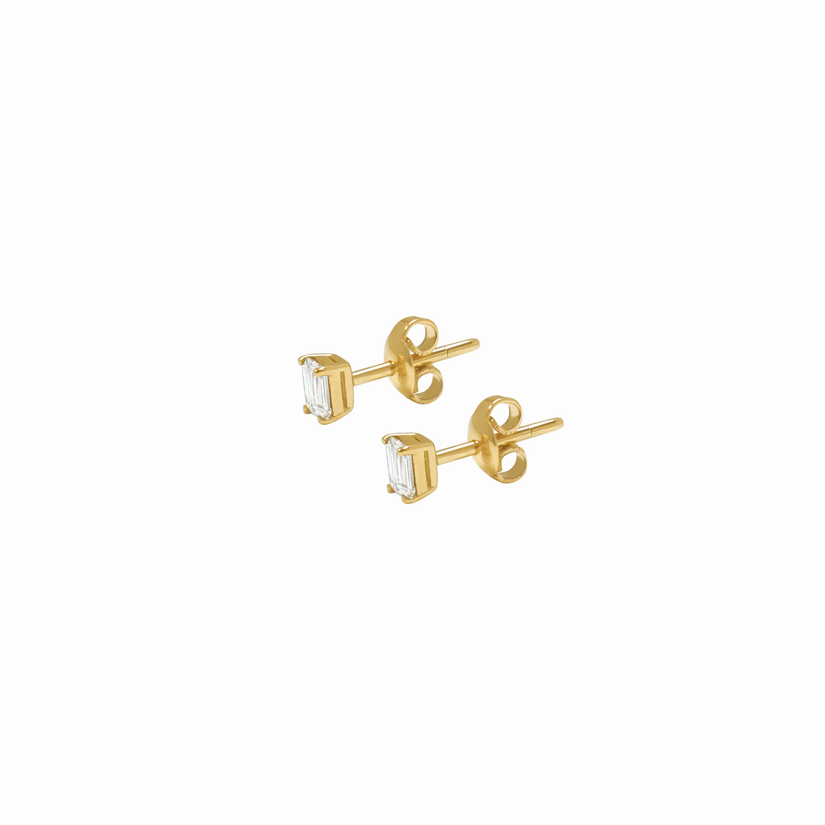 Aretes solitario en oro amarillo de 18K corte esmeralda