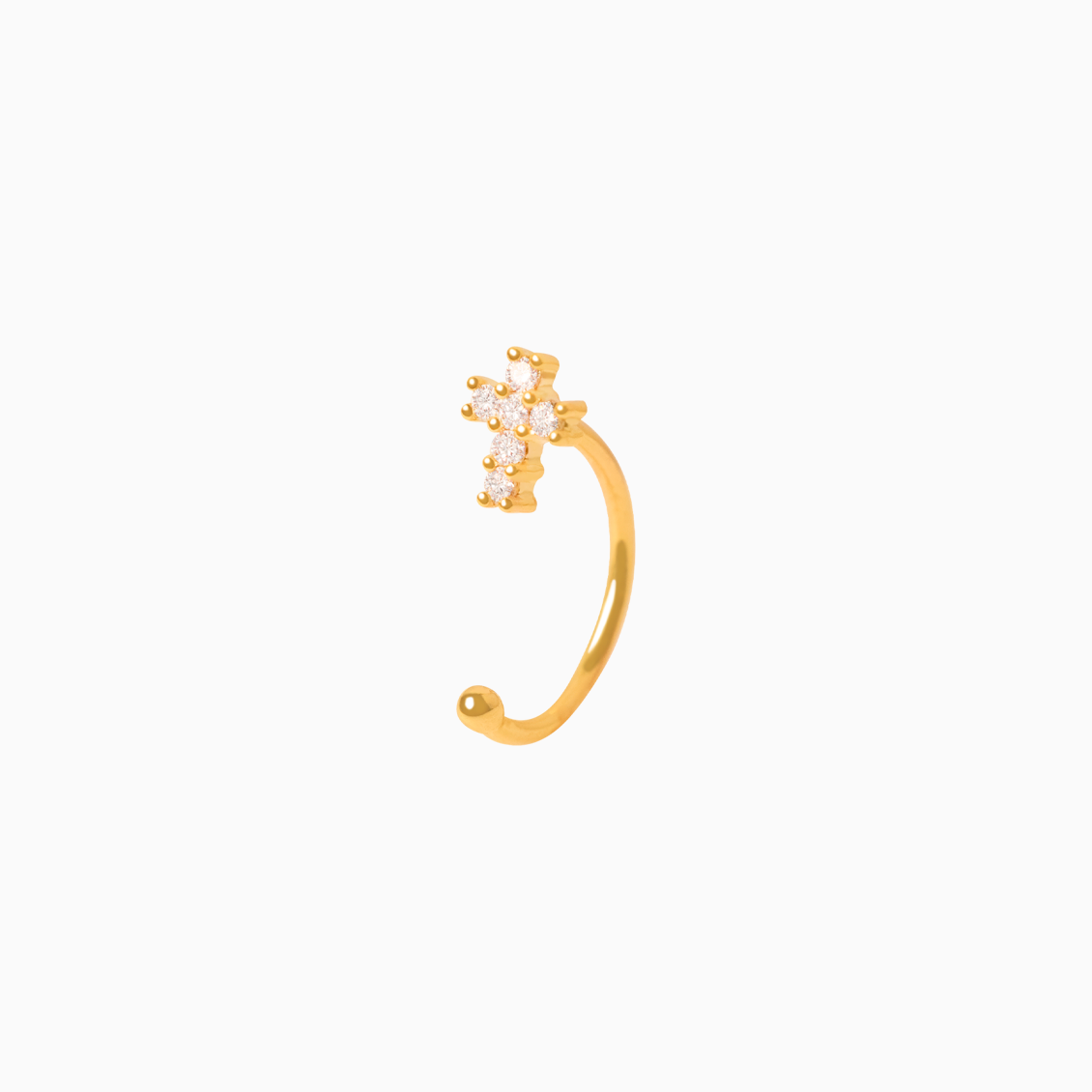 Medio arete en oro amarillo de 18K piercing cruz con brillantes