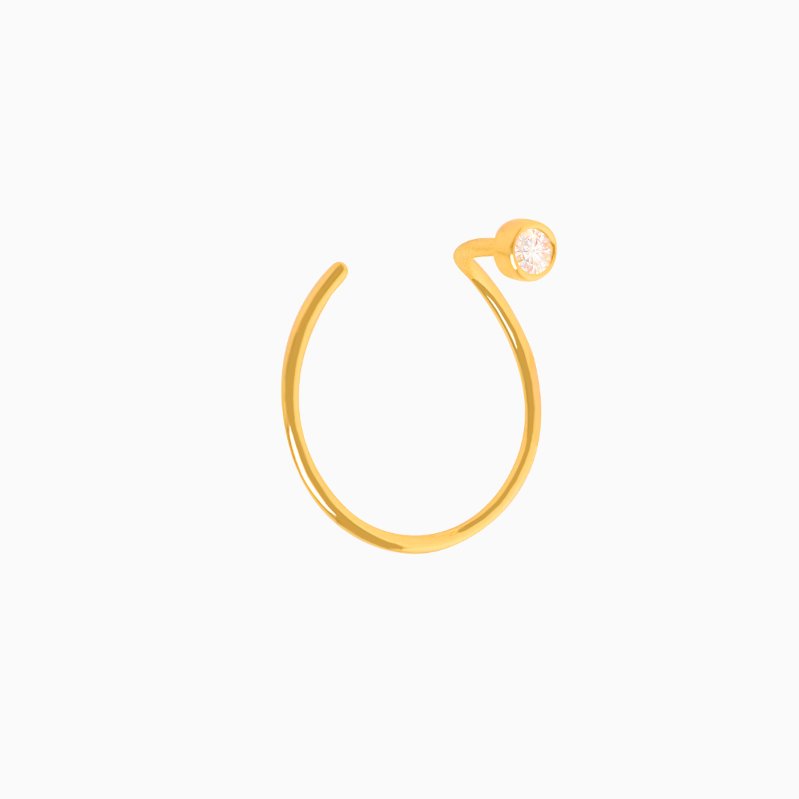 Medio arete en oro amarillo de 18K piercing circular con brillante