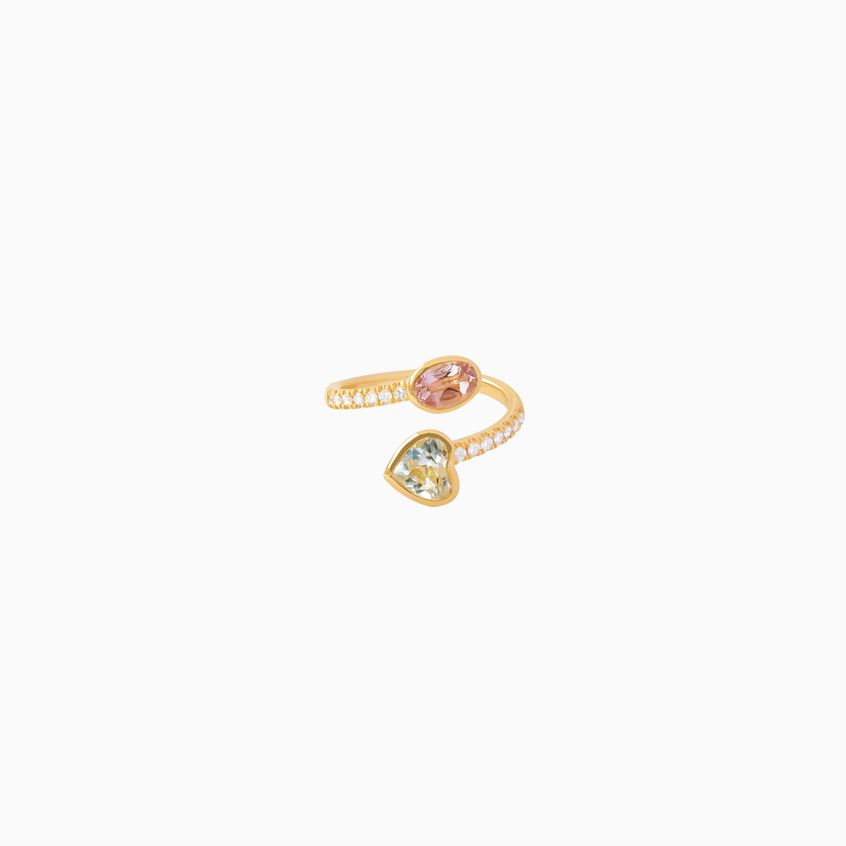 Anillo en oro amarillo de 18K cruzado con brillantes, morganita y cuarzo cristal