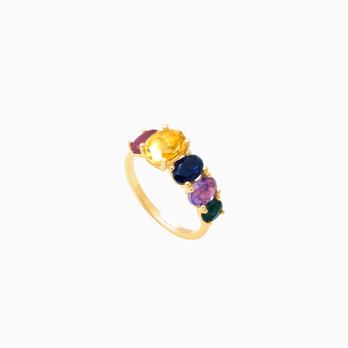 Anillo en oro amarillo de 18K piedras de colores en corte oval