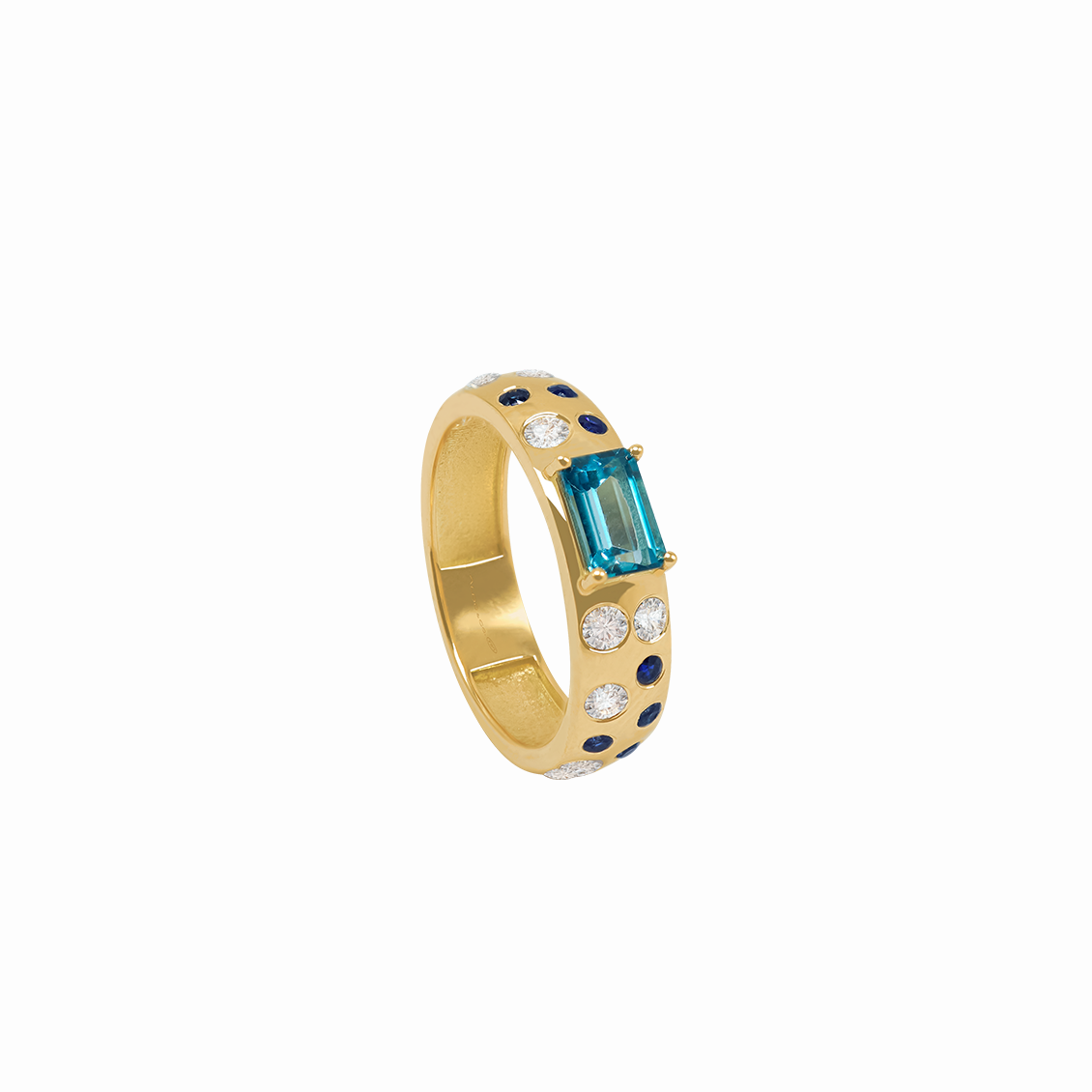 Anillo en oro amarillo 18K corte esmeralda con zafiros azules y blancos