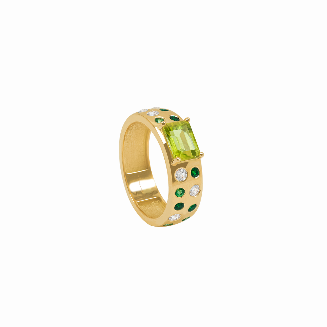 Anillo en oro amarillo 18K con peridoto corte esmeralda, zafiro blanco y tsavorita