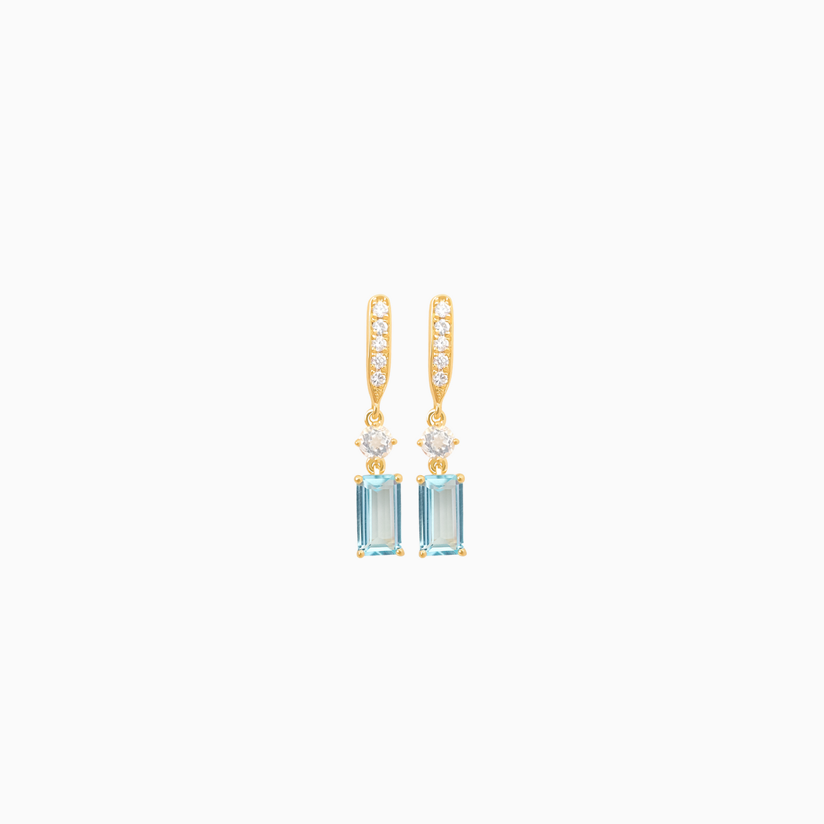 Aretes en oro amarillo de 18K con brillantes, cuarzo cristal y topacio azul