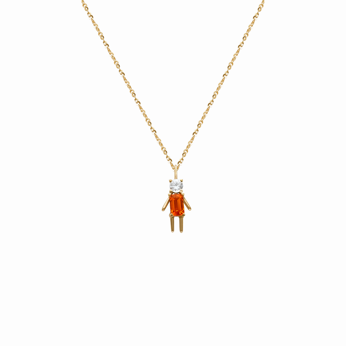 Dije oro amarillo 18K niño con zafiros blancos y naranjas corte esmeralda