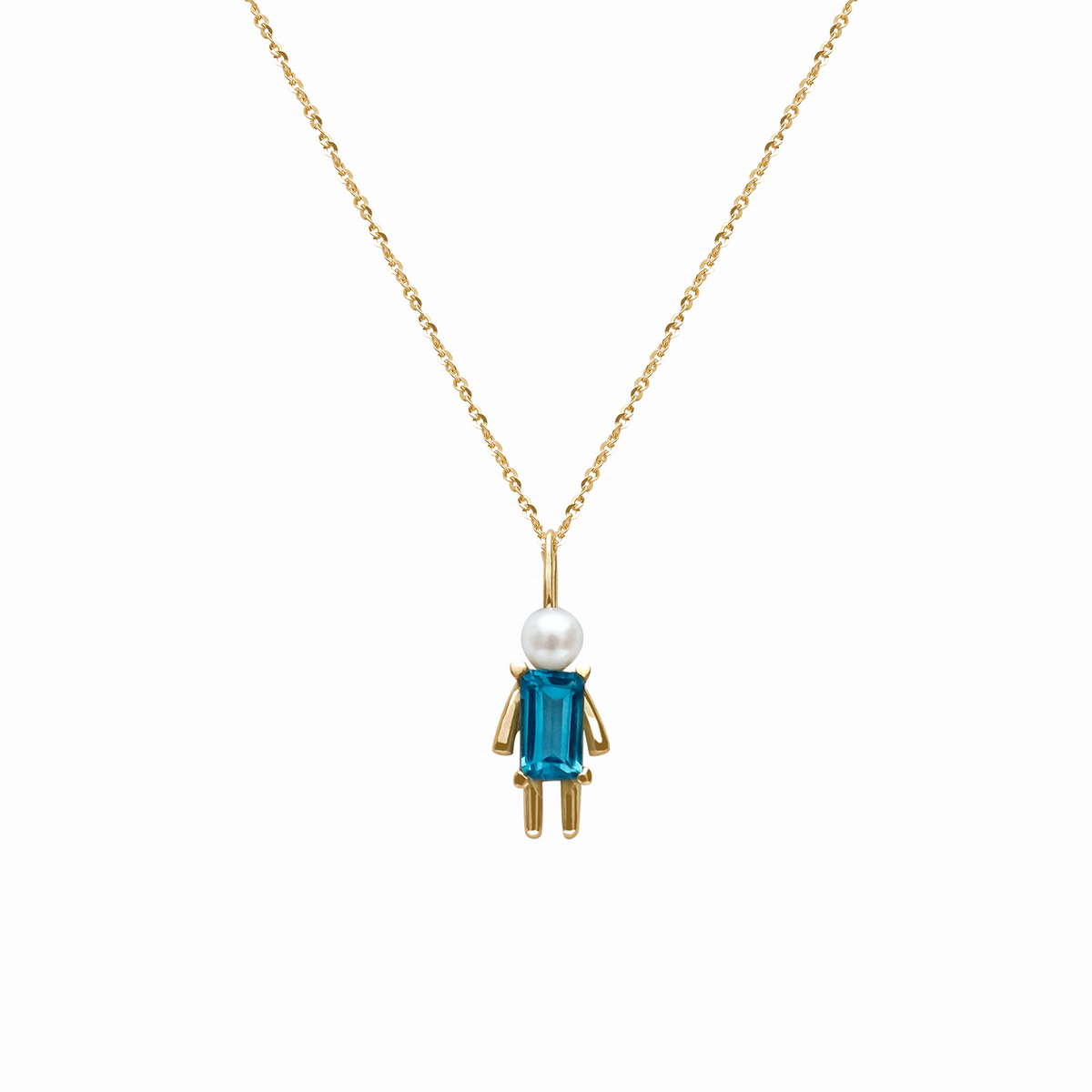 Dije en oro amarillo 18K niño grande con perla y topacio corte esmeralda