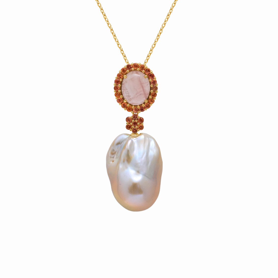 Dije en oro amarillo 18K con perla barroca asimétrica con zafiro rosa y naranja