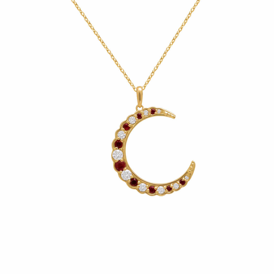 Dije en oro amarillo 18K en forma de luna con rubíes y zafiros rojos, naranjas y brillantes