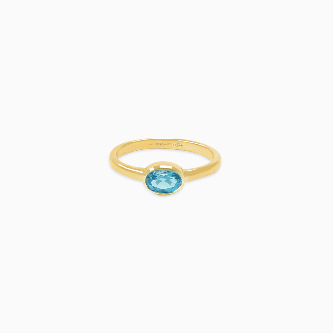 Anillo oro amarillo 18K topacio azul london blue oval