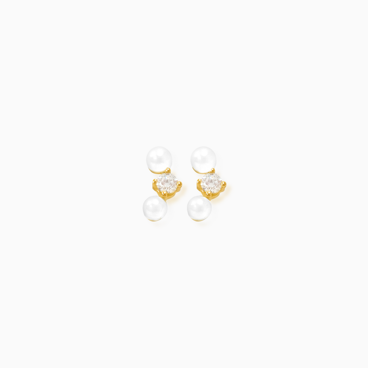 Aretes en oro amarillo 18K en curva con perlas y brillantes