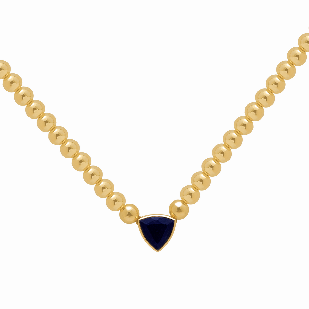 Collar en oro amarillo 18K cuarzo azul trillant con beads y cadena