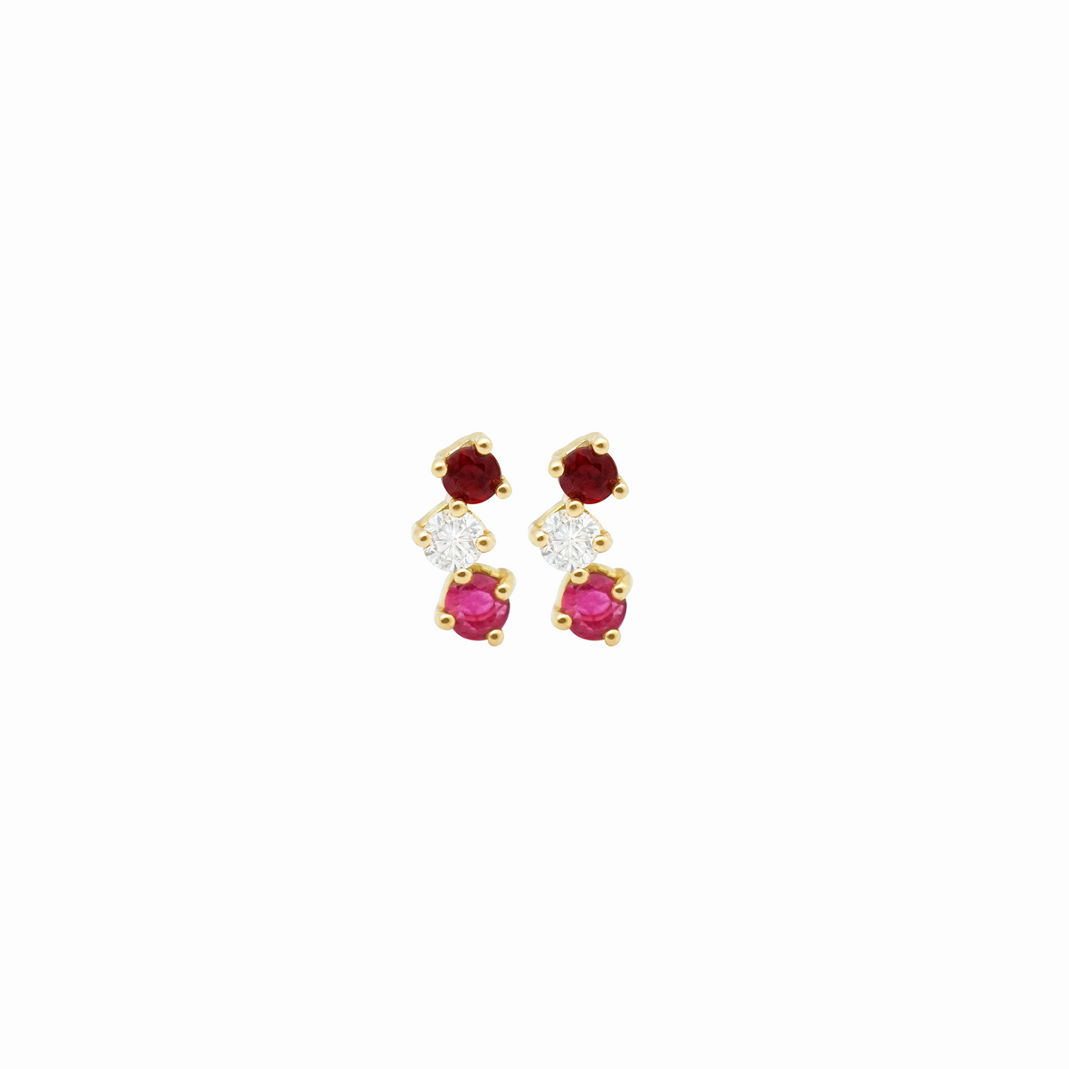 Aretes en oro amarillo 18K en curva con rubís y brillantes