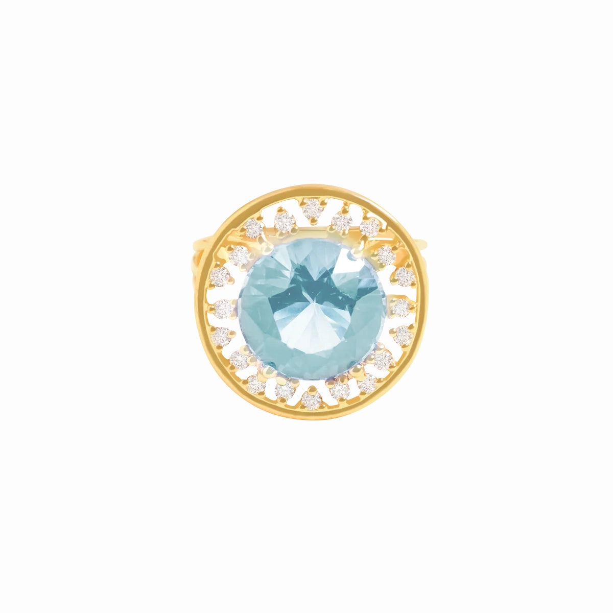 Anillo en oro amarillo de 18K redondo calado con topacio azul redondo