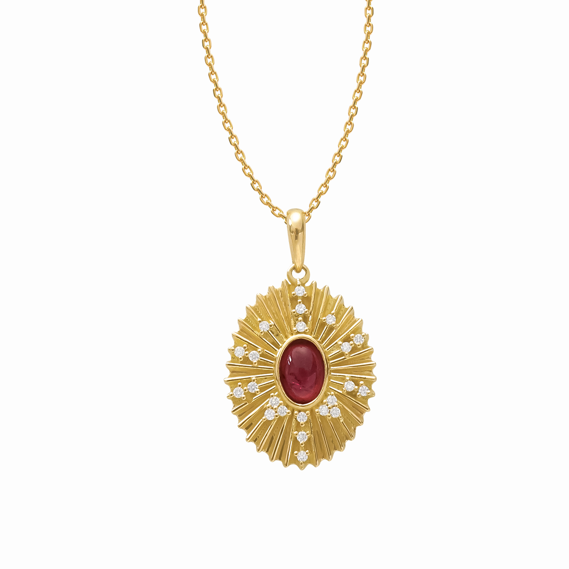 Dije en oro amarillo 18K oval con rayitas y relieve con turmalina rosa y brillantes salpicados