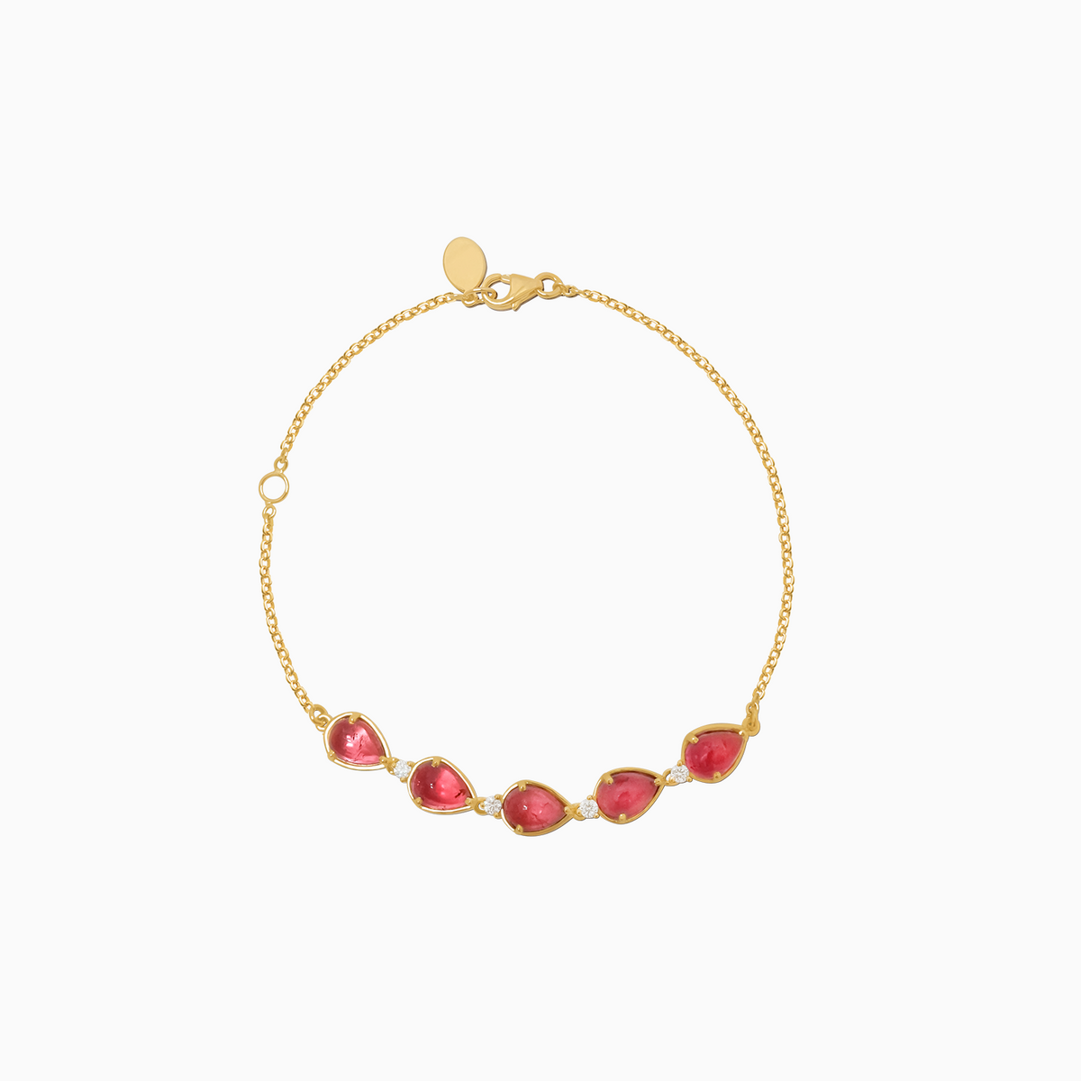 Pulsera oro amarillo de 18K con cinco turmalinas corte pera cabuchón