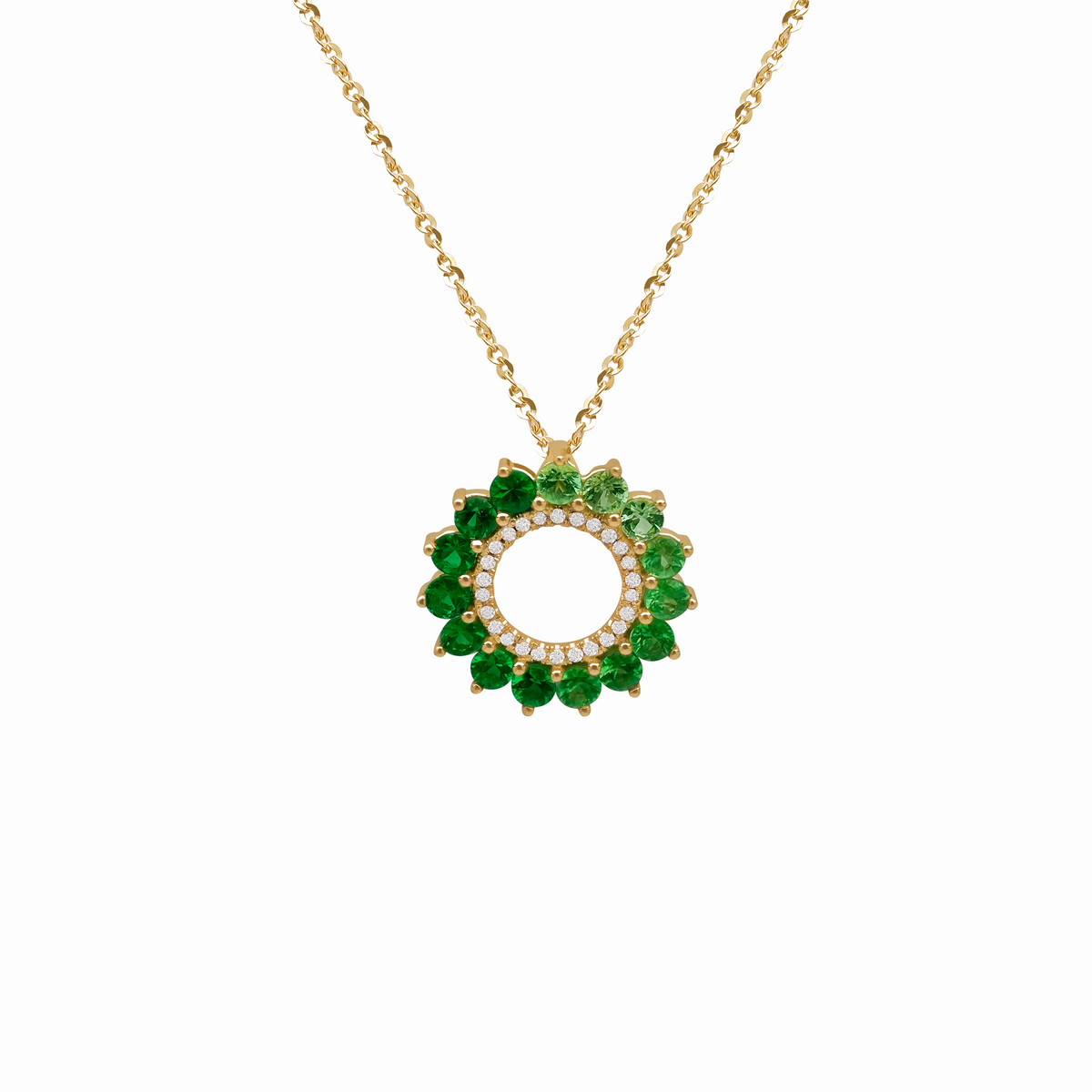 Dije en oro amarillo 18K con tsavoritas y brillantes