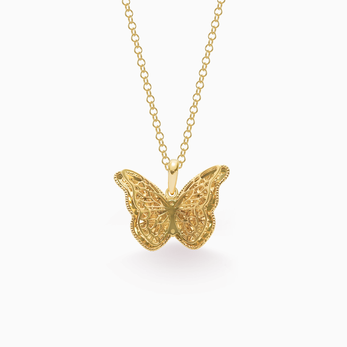 Dije en oro amarillo de 18K mariposa voladora