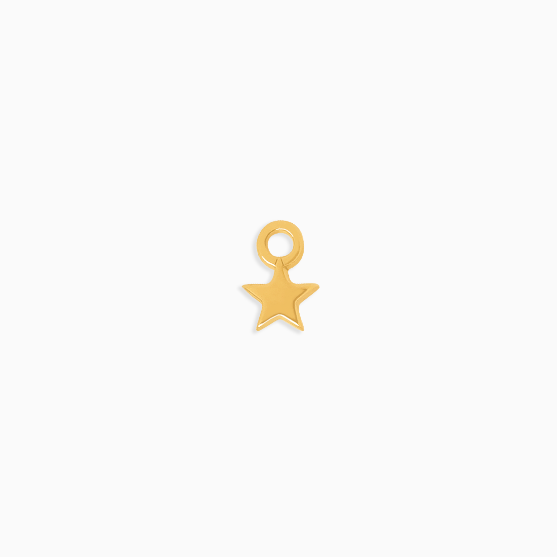 Charm en oro amarillo de 18K estrella