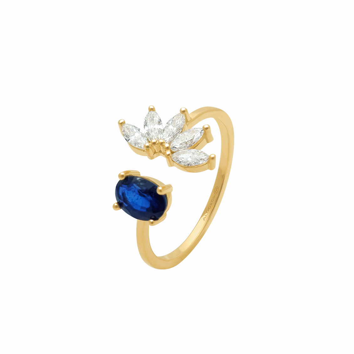 Anillo en oro amarillo 18K oval con zafiro y brillantes marquise