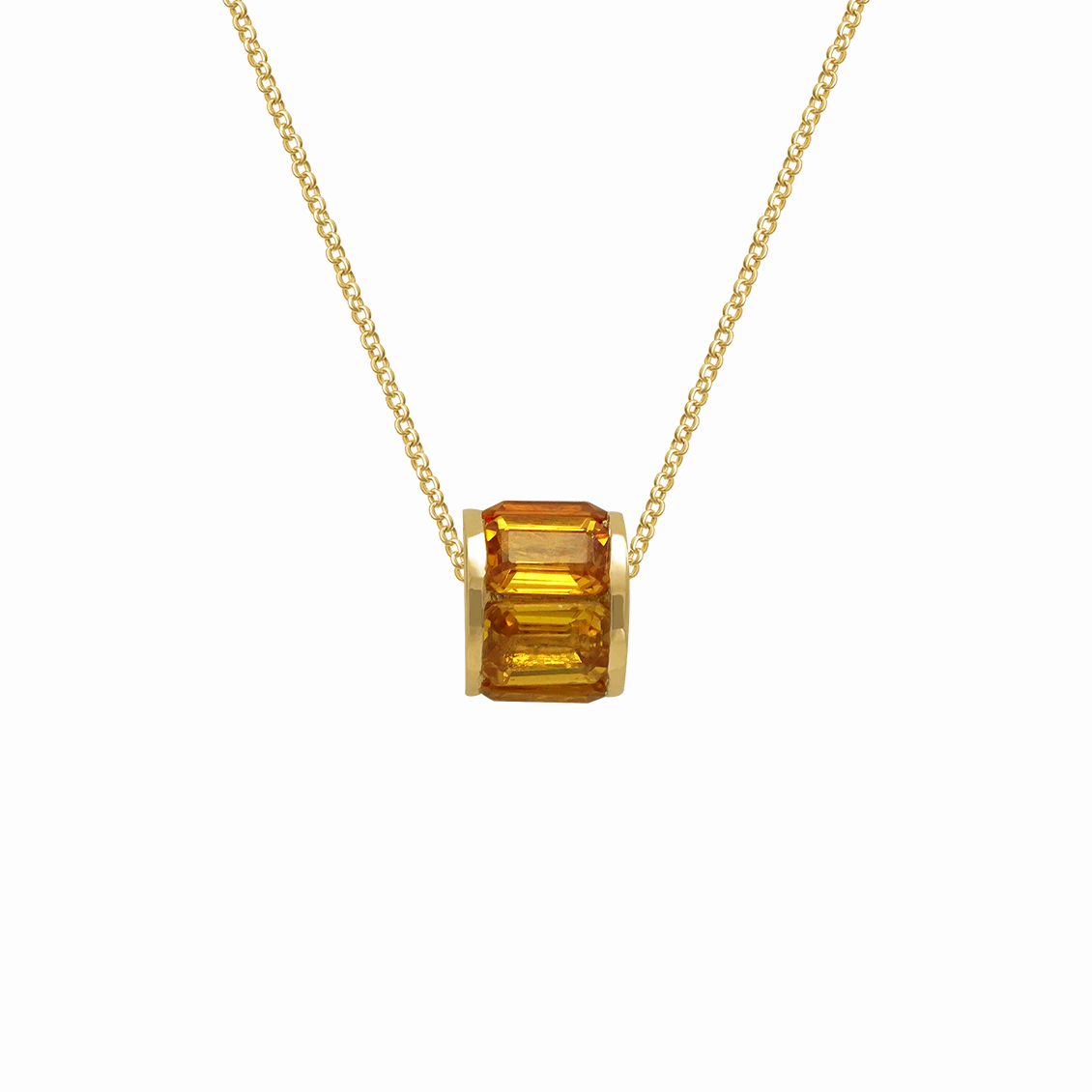 Collar en oro amarillo 18K con arandela y zafiros amarillo y naranjas corte esmeralda