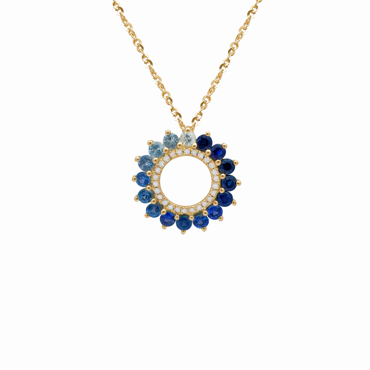 Dije en oro amarillo 18K circular estrellado con zafiros azules en degrade