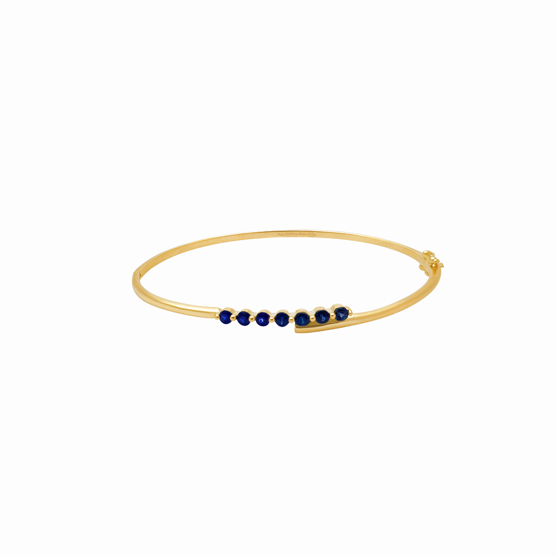 Pulsera en oro amarillo 18K con zafiros intercalados con uñas redondas