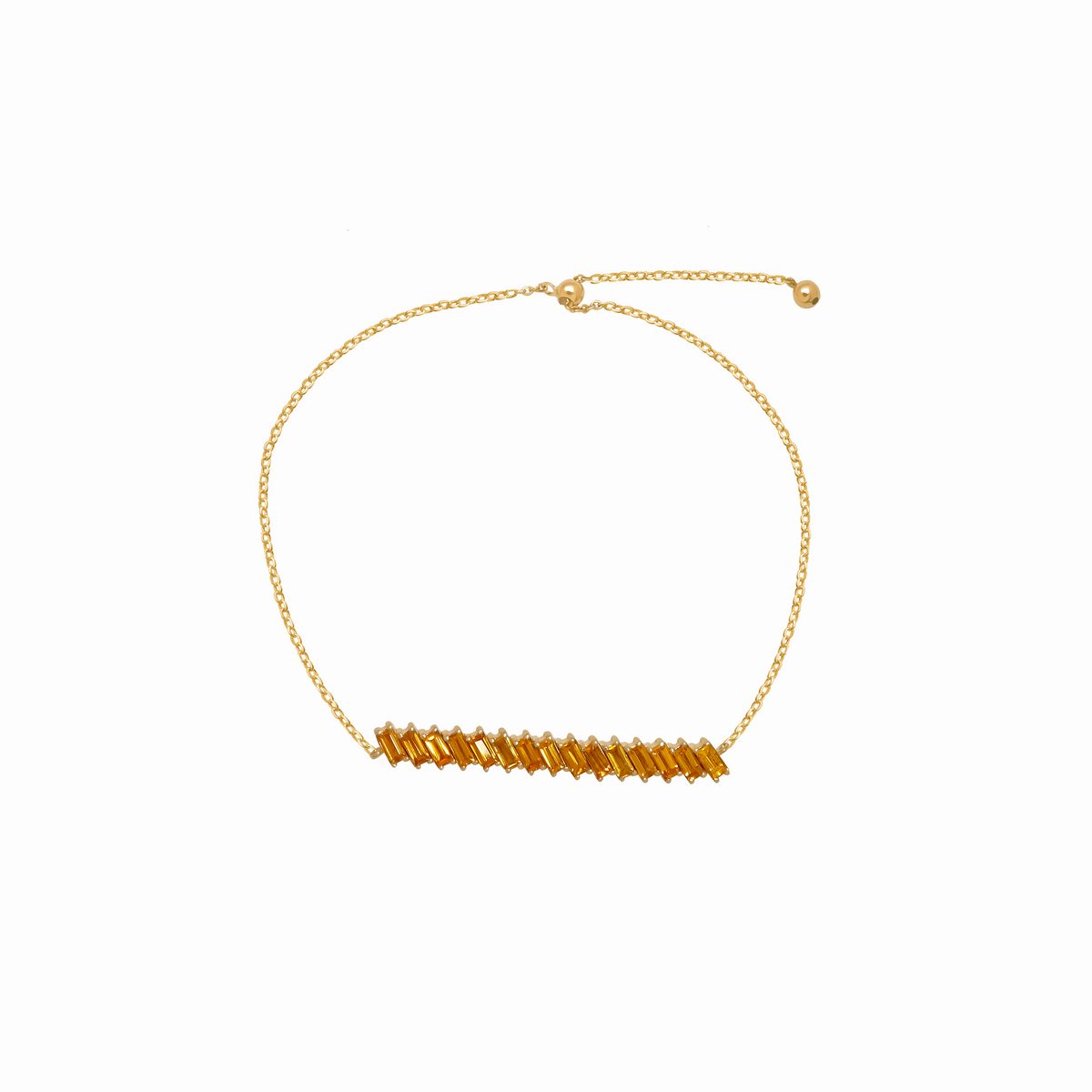 Pulsera en oro amarillo de 18K tennis con zafiros amarillos baguette