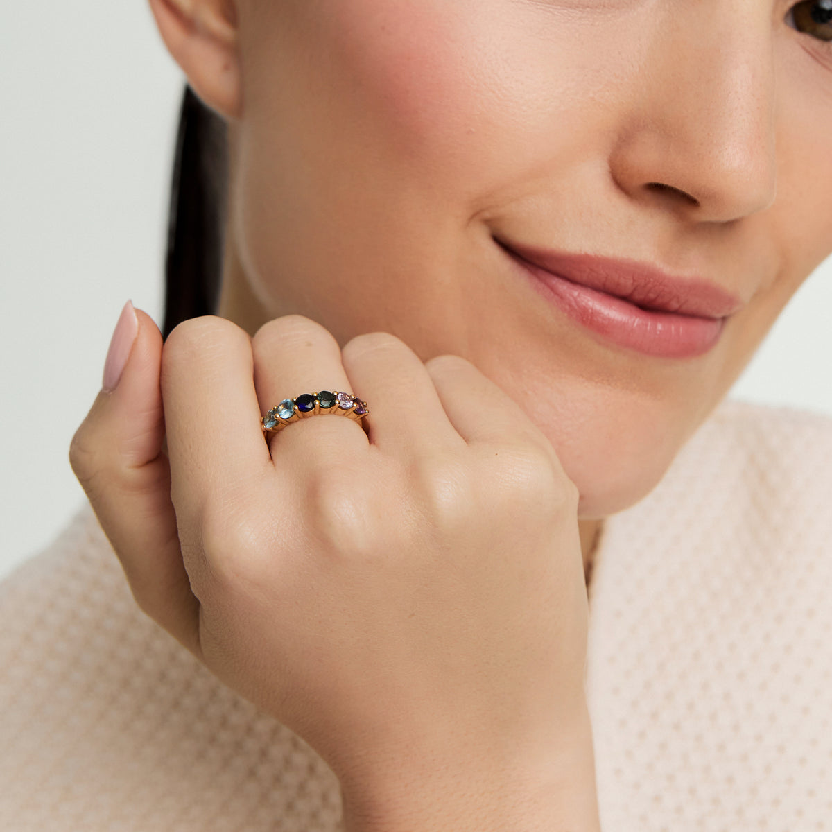 Anillo oro amarillo 18K cintillo con turmalina