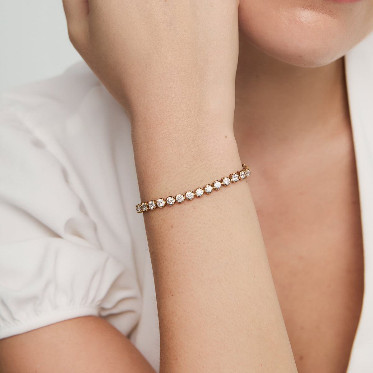 Pulsera en oro amarillo de 18K tennis con chatones redondos