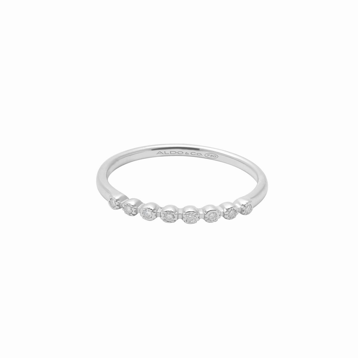 Anillo en oro blanco 18K medio reviere con brillantes