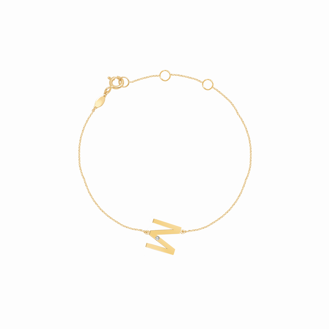 Pulsera en oro amarillo 18K letra M con brillante