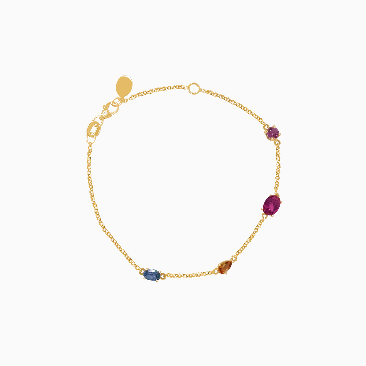 Pulsera en oro amarillo de 18K con andalucita, turmalina rosada, azul y morada