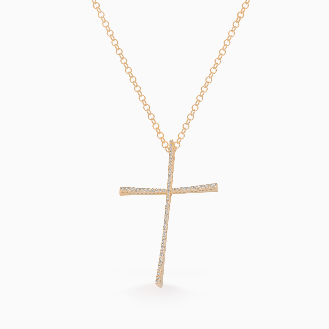 Dije en oro rosado de 18K cruz con brillantes