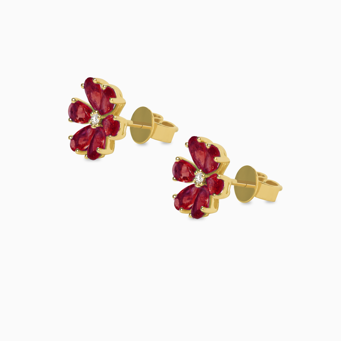 Aretes en oro amarillo de 18K flor con rubís gota
